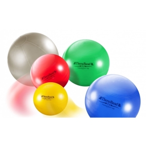 Zestaw piłek rehabilitacyjnych TheraBand ABS w różnych kolorach, przeznaczonych do ćwiczeń stabilizacji.