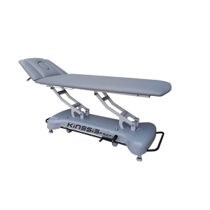 Stół rehabilitacyjny PROFI 2 PLUS KINESIS z szarą tapicerką i regulowaną sekcją zagłówka.