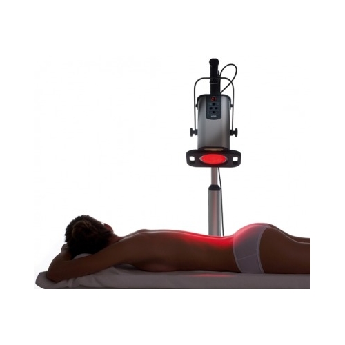 Zabieg z użyciem lampy sollux LUMINA V5.0, promieniowanie skierowane na plecy pacjentki.