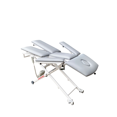 Stół CROSS L z wielosegmentowym blatem do manualnego drenażu limfatycznego.