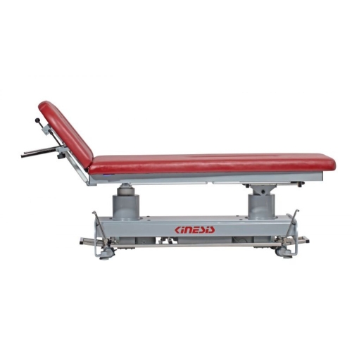 Stół PERFECT II w pozycji leżącej z podnoszonym zagłówkiem i elektryczną regulacją wysokości.