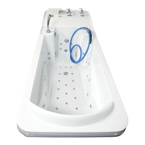 Wnętrze wanny AQUARIUS E z dyszami hydromasażu i wężem zabiegowym do masażu podwodnego.